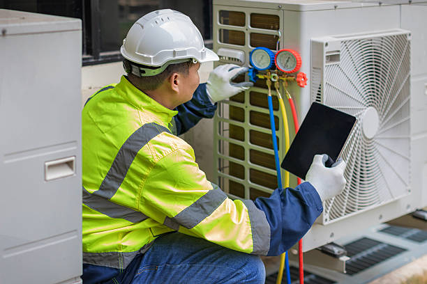 Professional Air Duct Cleaning technician working in Kellyton, AL